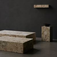 Textured beige stone furniture on a dark background, featuring subtle pink and gray patterns for a modern aesthetic.