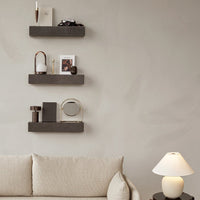 Neutral beige and gray color palette with sleek, minimalistic shelf patterns and soft textures.