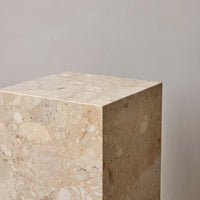 Light beige stone pedestal with subtle variations in texture and pattern for a natural, elegant look.