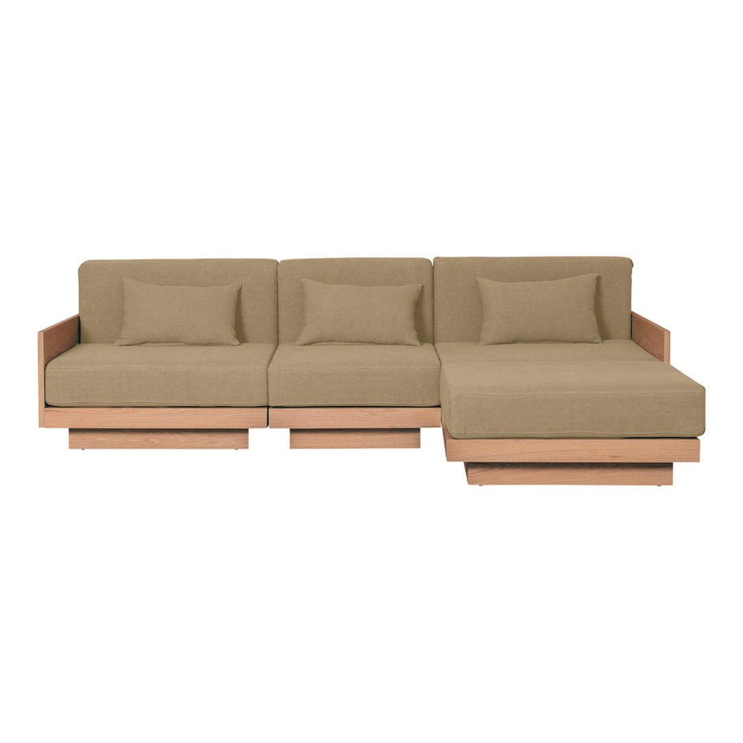 Beige sectional sofa with clean lines, featuring a simple design and plush cushions on a light wood frame.