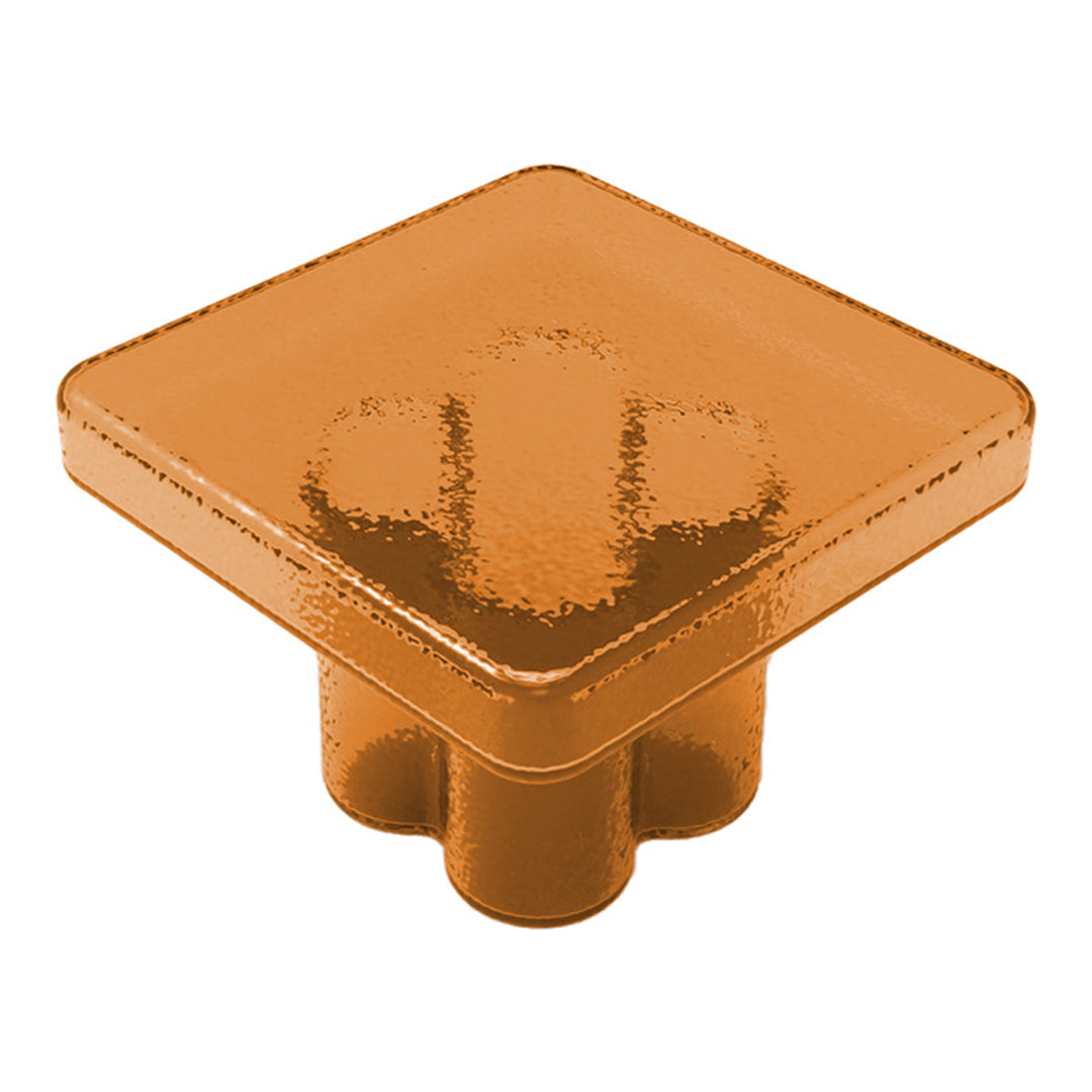 Shiny square orange product with a smooth, reflective surface and rounded edges. Perfect for modern designs.