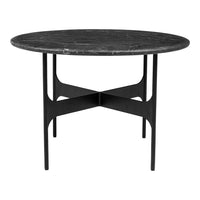 Round black marble table with subtle white veining and a sleek black metal base. Modern minimalist design.