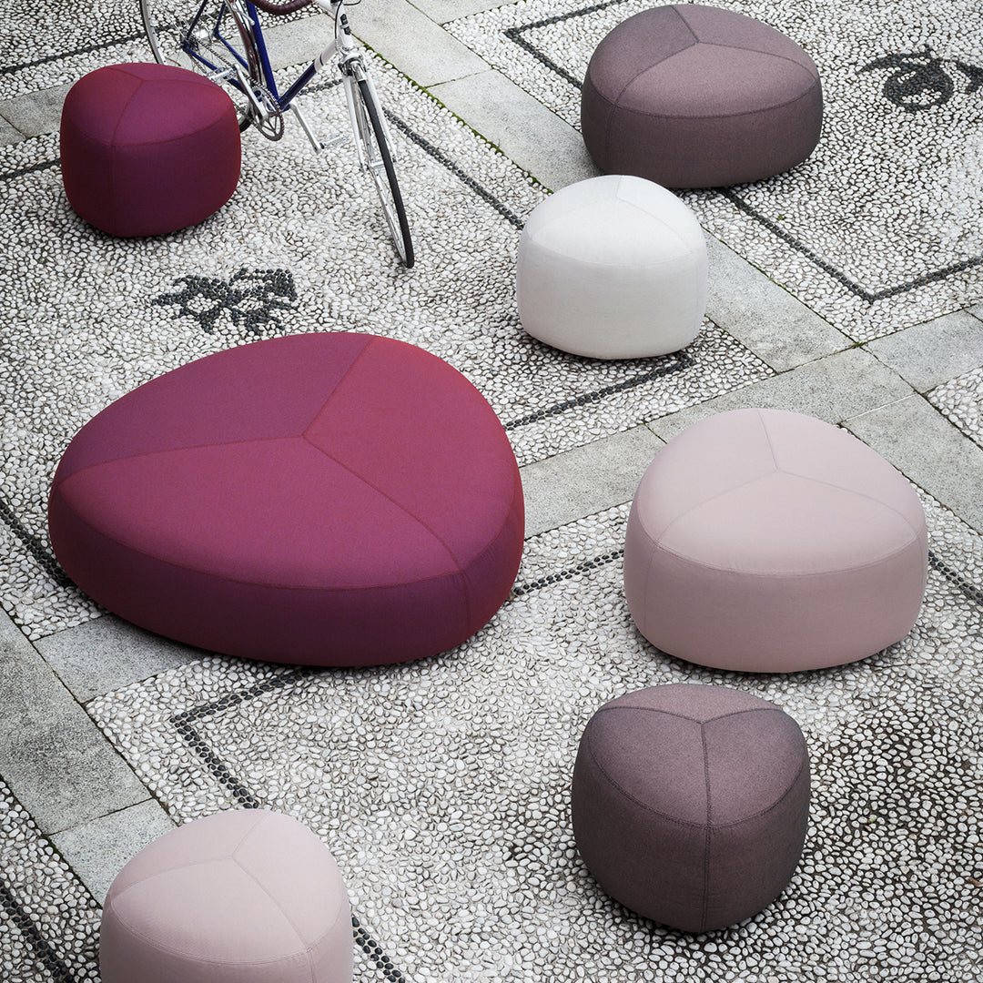 Colorful seating in shades of purple, pink, and white, featuring playful heart and round shapes. Perfect for modern decor.