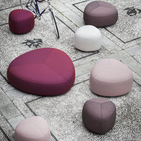Colorful seating in shades of purple, pink, and white, featuring playful heart and round shapes. Perfect for modern decor.