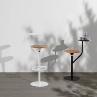 Modern bar stools with white and black metal bases and natural wooden seats, featuring sleek, minimalist designs.