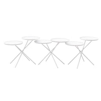 Set of five white, circular side tables with minimalist design and slender, crisscrossing legs. Perfect for modern decor.