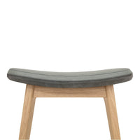 Gray upholstered seat with smooth texture, complemented by natural wood legs for a minimalist look.