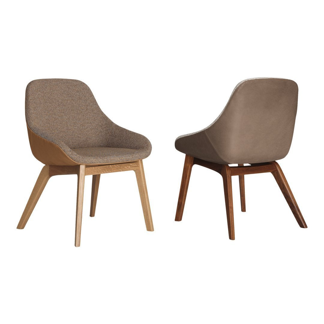 "Modern brown upholstered chair with light and dark wooden legs, featuring a sleek, minimalist design."