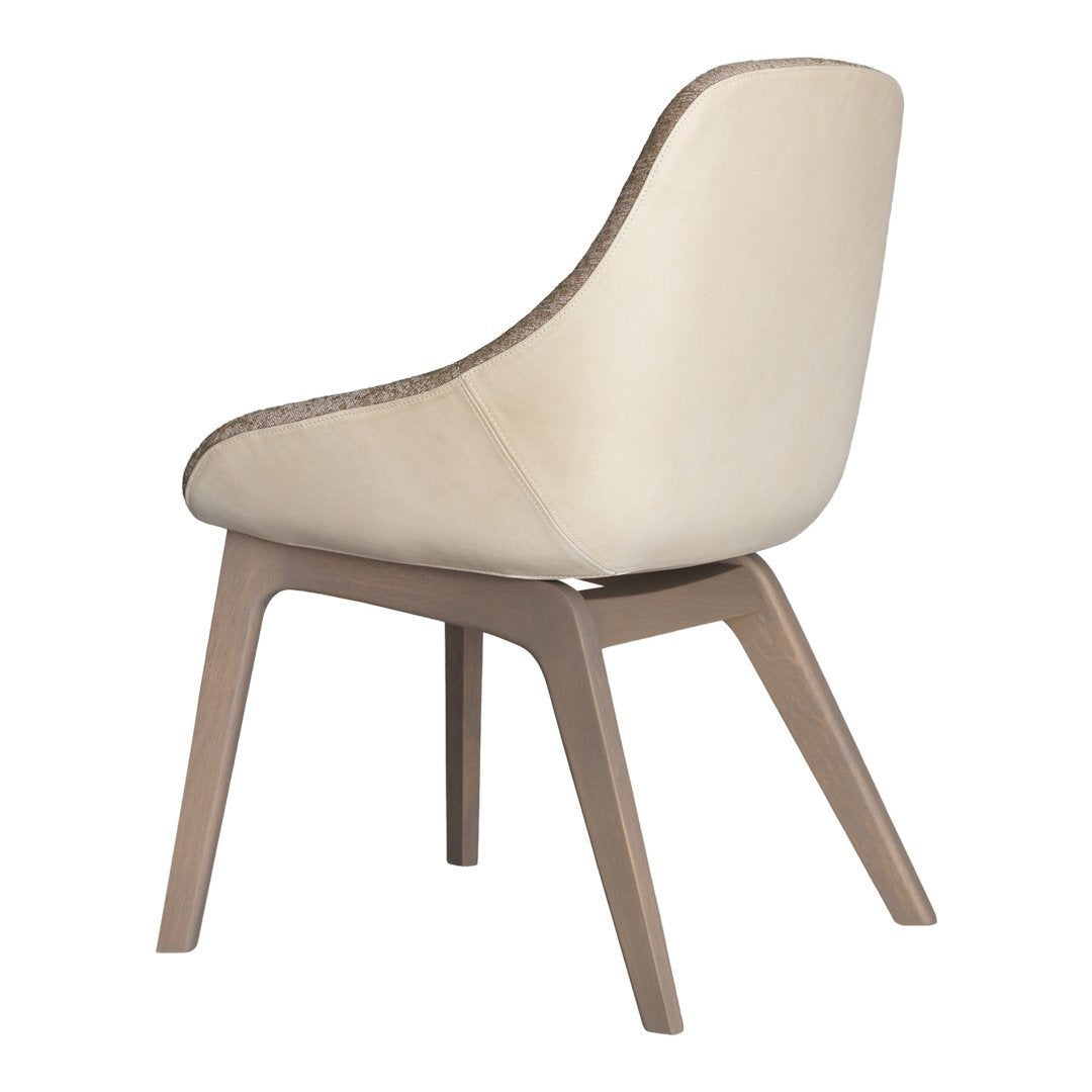 Beige upholstered chair with a smooth finish and light wood legs, featuring subtle stitching detail.