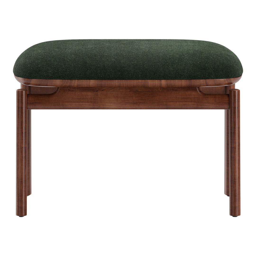 Green upholstered stool with a rounded top and rich walnut wood legs, featuring a simple, modern design.
