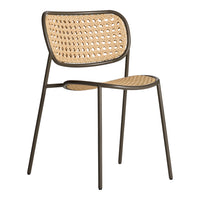 Natural woven rattan seat with a sleek black metal frame, featuring a contemporary pattern for modern decor.