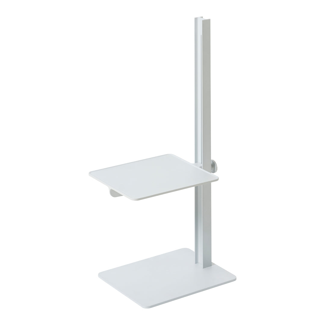 Minimalist white metal stand with a sleek, modern design and clean lines, featuring a flat upper shelf and base.