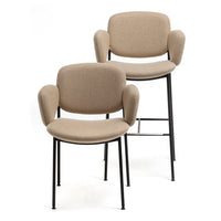 Pair of beige upholstered chairs with smooth, rounded designs and black metal legs. Elegant, modern style.