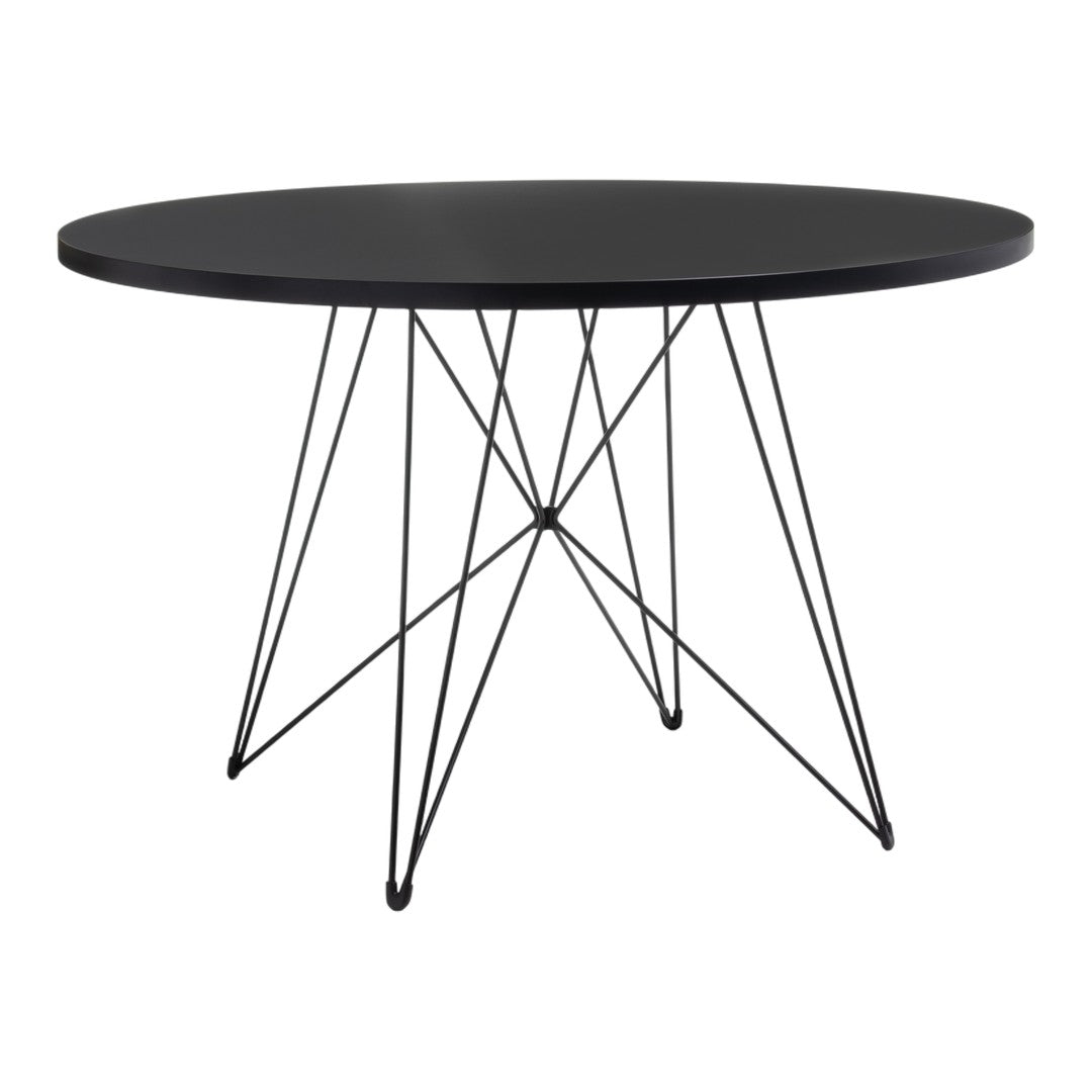 Black round table with a smooth top and intricate black wire base, perfect for modern decor.