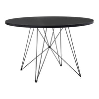 Black round table with a smooth top and intricate black wire base, perfect for modern decor.