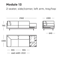 "Modular sofa in soft gray with clean lines and subtle geometric pattern on the cushions."