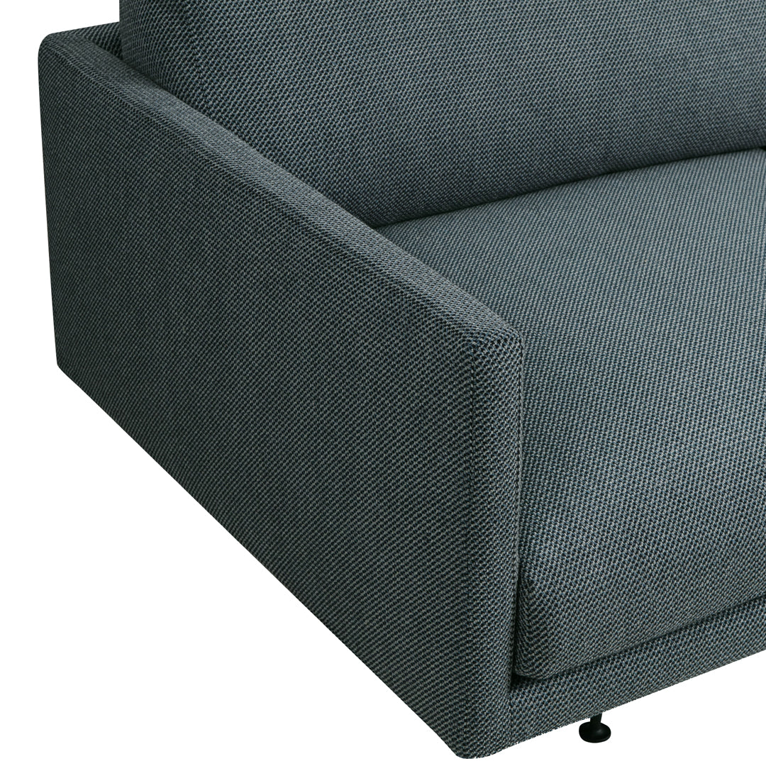 Gray textured sofa arm with a modern design and subtle patterned upholstery. Perfect for contemporary interiors.