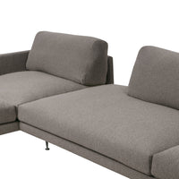 Gray fabric sectional sofa with minimalist design and soft, textured upholstery. Perfect for modern living spaces.