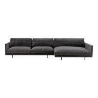 Modern gray sectional sofa with smooth velvet texture and sleek metal legs, featuring a minimalist design.