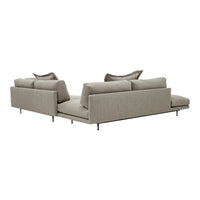 Modern L-shaped sofa in soft beige fabric with minimalist design and clean lines, perfect for contemporary decor.
