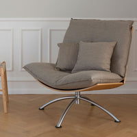 Stylish gray lounge chair with soft cushions and a wooden base, featuring a sleek metal frame and modern design.