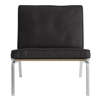Black modern chair with a sleek design and smooth upholstery, featuring a minimalist silver metal frame.