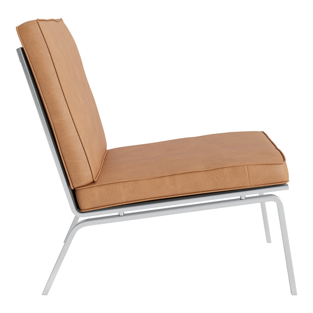 Modern chair with a tan cushion and sleek silver frame, featuring a minimalist design and clean lines.