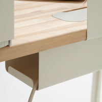 Light wood surface with smooth, cream-colored accents and minimalist design. Clean lines and modern aesthetic.