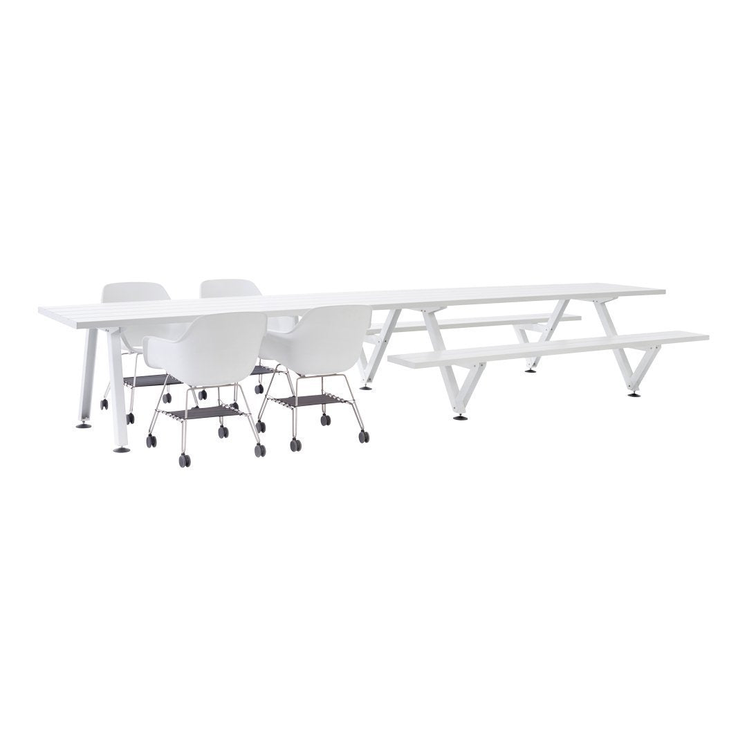 White modern dining table and chairs with minimalist design and sleek lines. Perfect for contemporary spaces.