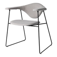 Light gray upholstered chair with a minimalist design and black metal frame. Stylish and modern for any space.