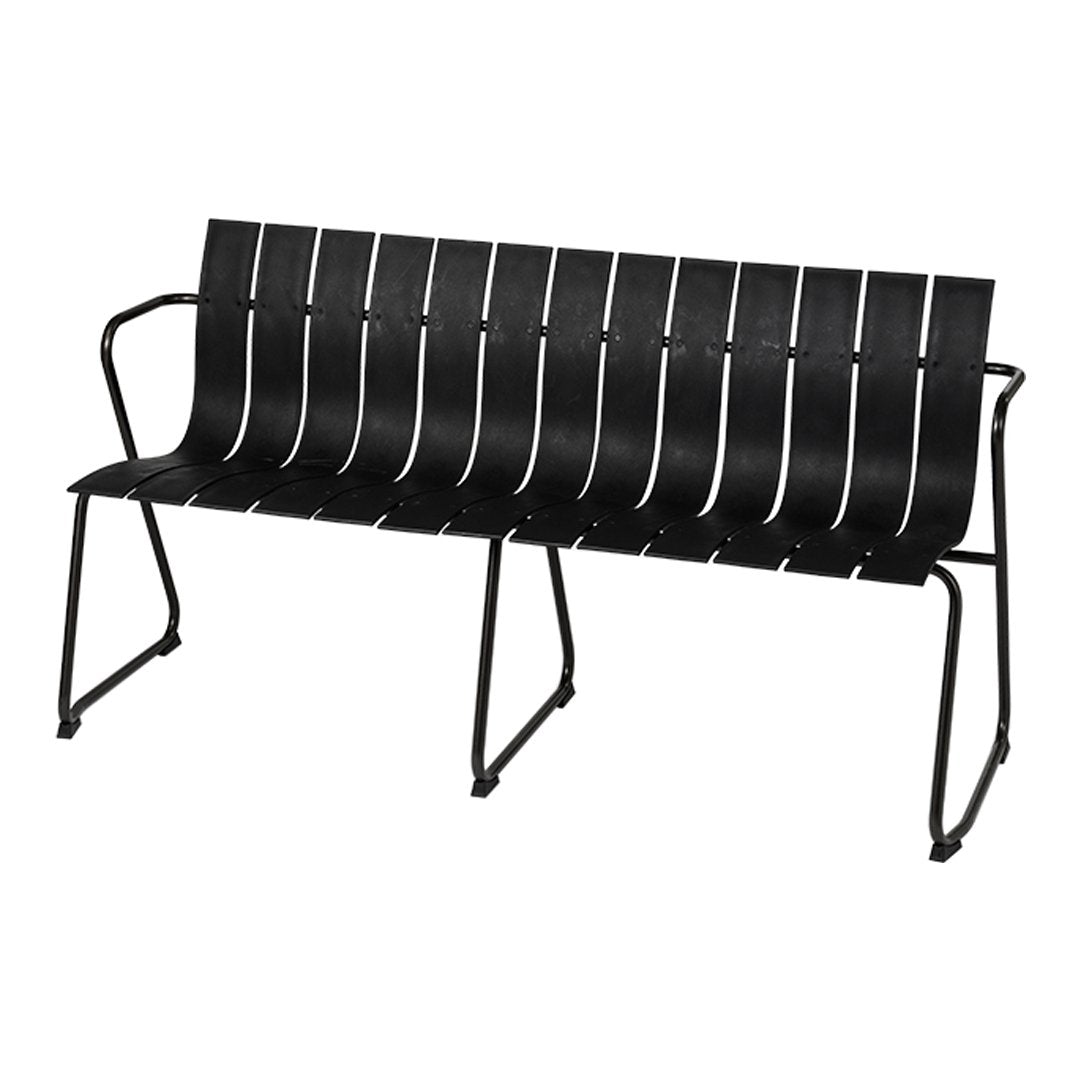 Black and white striped metal bench with a modern design, featuring sleek lines and a minimalist aesthetic.