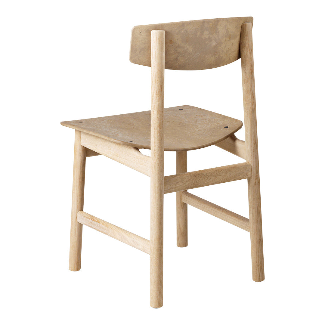 Natural wood chair with a light beige finish and smooth, minimalist design. Perfect for modern decor.