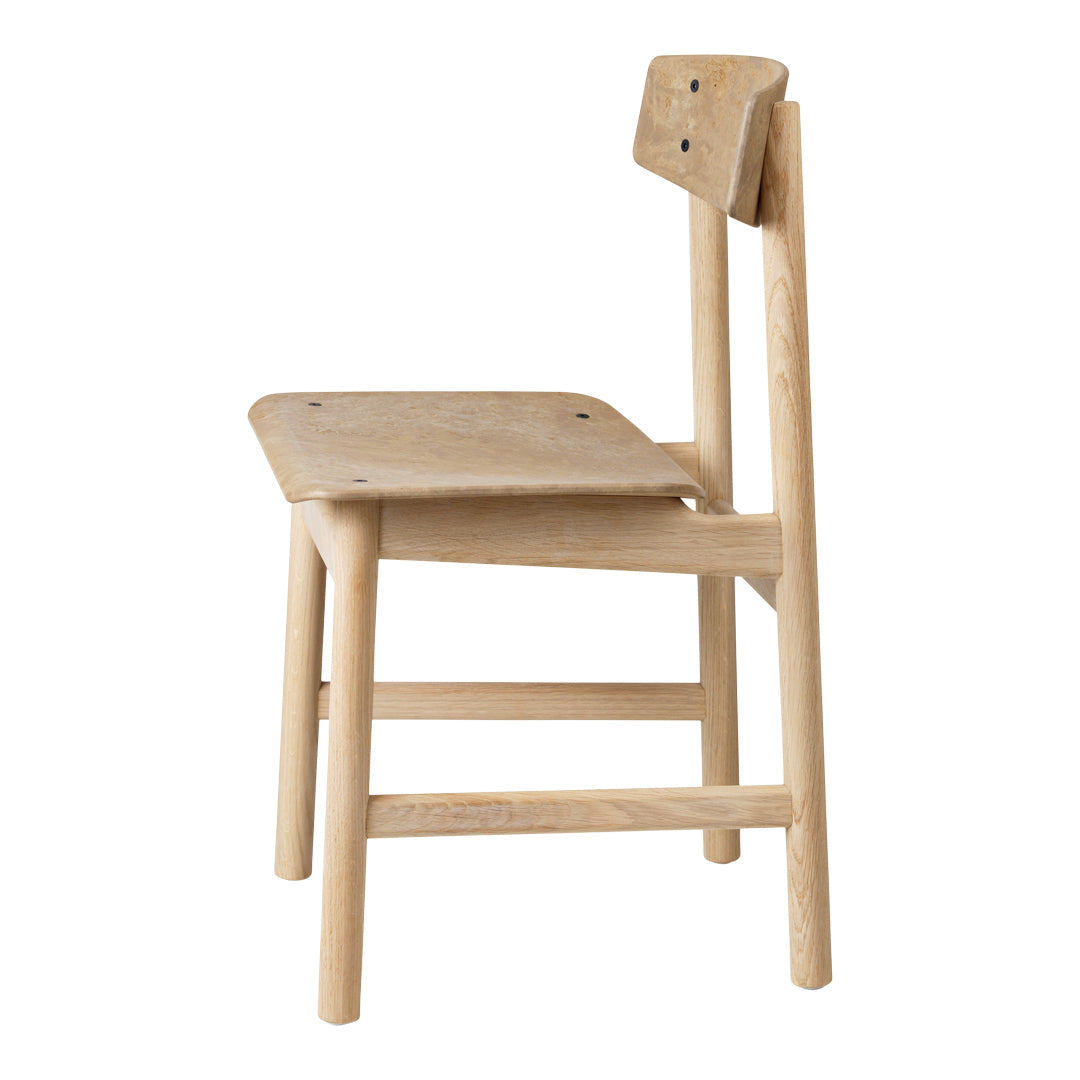 Natural wood chair with a light finish, featuring smooth surfaces and minimalistic design. Perfect for modern decor.