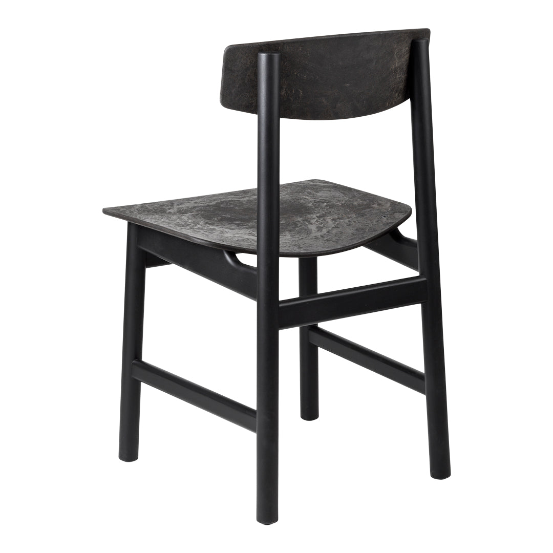 Black wooden chair with a textured seat and backrest, featuring a modern minimalist design.