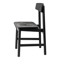 Black wooden chair with a textured seat and back, showcasing subtle patterns in a modern design.