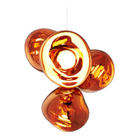 Glossy orange pendant light with organic, fluid shapes and reflective surfaces, creating a vibrant visual appeal.