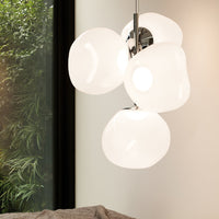 White, glossy pendant light with a fluid, organic shape, featuring a chrome base for a modern touch.