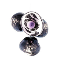 "Modern pendant light featuring a mix of purple, black, and translucent glass with swirling patterns."
