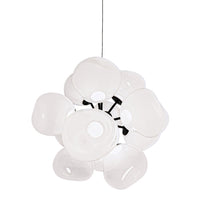 Stylish white floral pendant light with smooth, glossy petals and a modern black center. Perfect for contemporary decor.