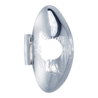 Chrome oval wall decor with a reflective surface and smooth, modern design. Ideal for sleek interiors.