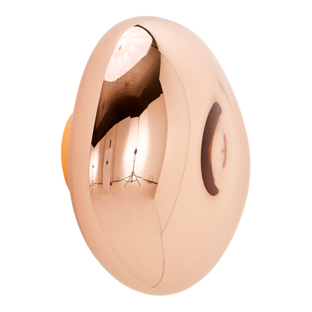Metallic rose gold egg-shaped product with smooth, reflective surface and subtle, dark accent. Perfect for modern decor.