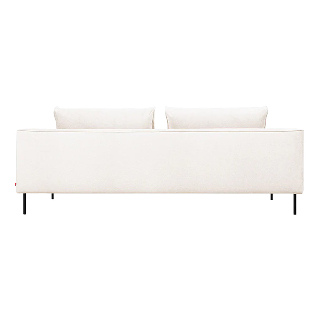 Stylish white sofa with a sleek, minimalist design, featuring subtle textures and two plush back cushions.