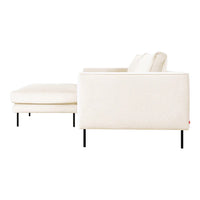 Light beige sofa with clean lines and minimalistic design, featuring smooth fabric and sleek black legs.
