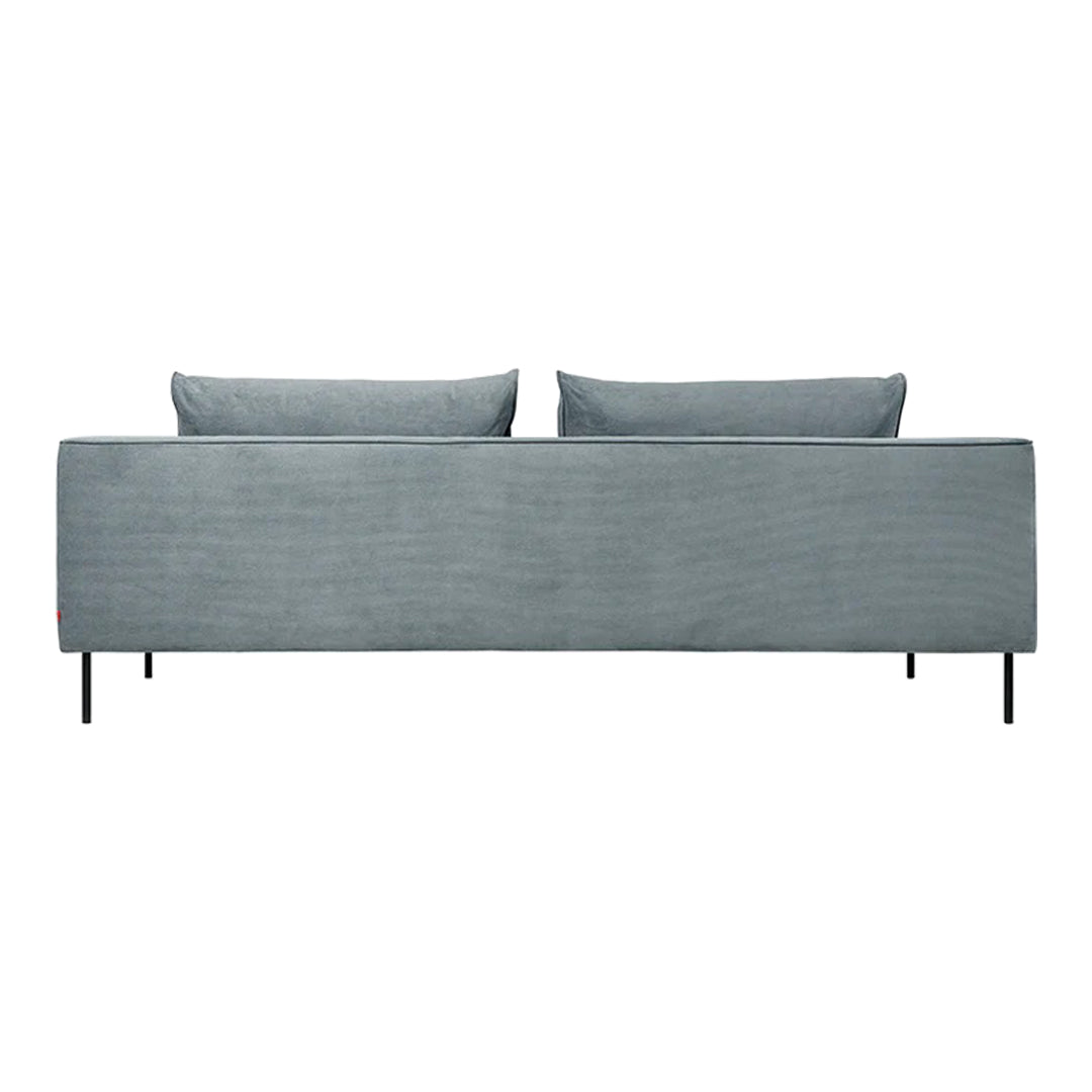 Sleek gray sofa with a smooth, textured fabric and two contrasting throw pillows. Modern minimalist design.