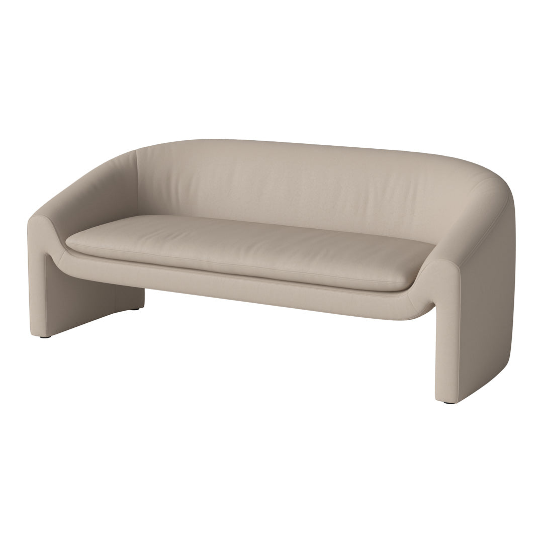 Beige minimalist sofa with smooth leather texture and curved design, perfect for modern interiors.