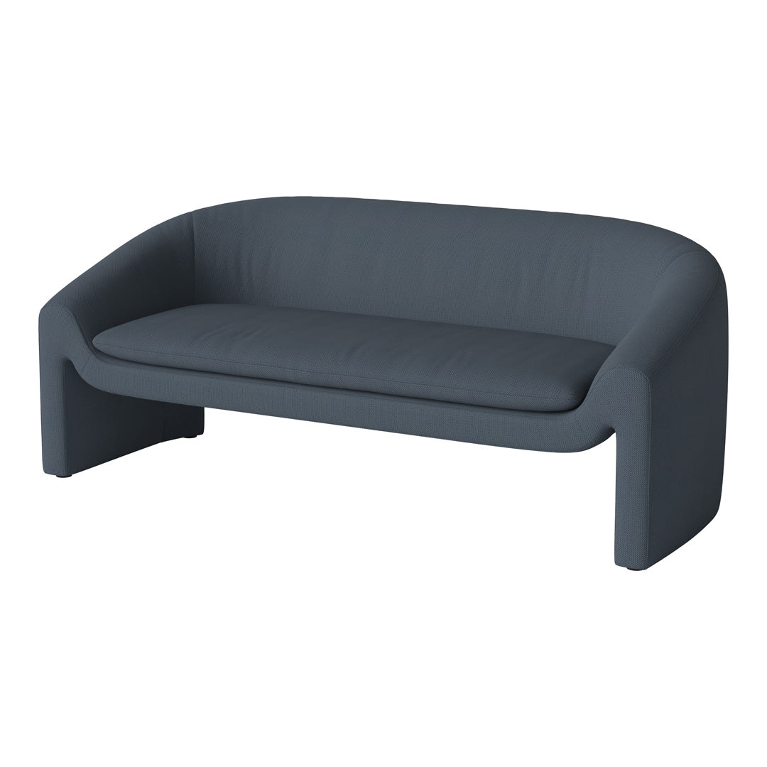 Modern curved sofa in deep charcoal gray with smooth fabric texture, perfect for contemporary living spaces.