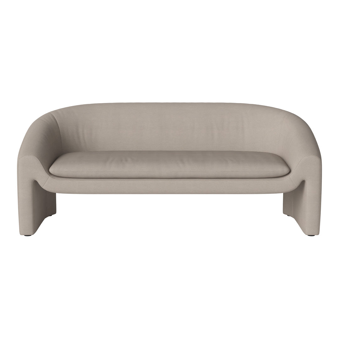 Soft beige sofa with a minimalist design, featuring smooth, curved lines and a textured fabric finish.