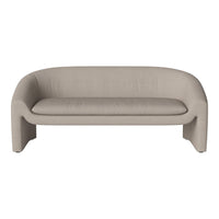 Soft beige sofa with a minimalist design, featuring smooth, curved lines and a textured fabric finish.