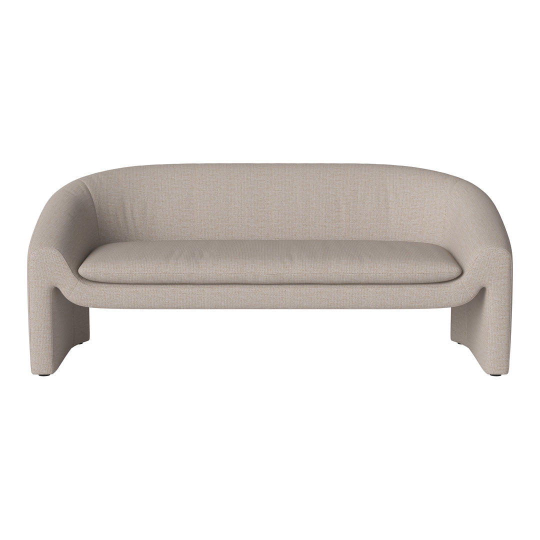 Beige curved sofa with subtle textured fabric, perfect for modern indoor decor. Versatile and stylish seating option.