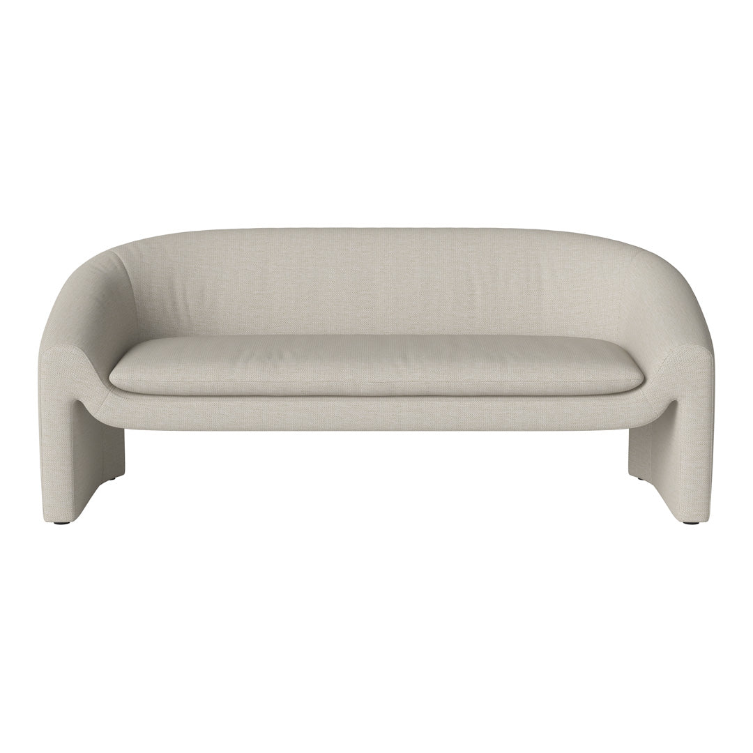 Light beige modern sofa with a textured fabric and smooth, rounded lines for a minimalist aesthetic.